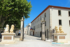 Saint Victoret, town hall and park entrance with statues of lions