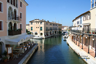 Port Grimaud, restaurant terrace on canal
