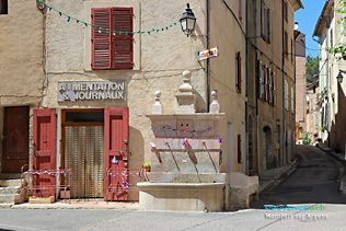 Montfort sur Argens, fountain and grocery store