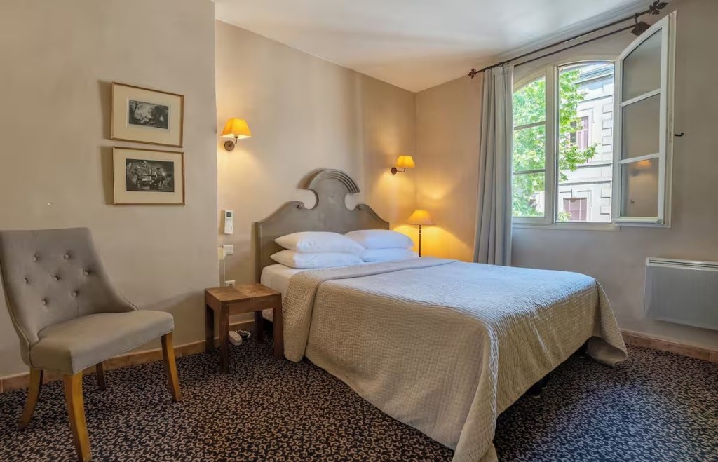 Chambre de l'H&ocirc;tel Amphith&eacute;&acirc;tre.