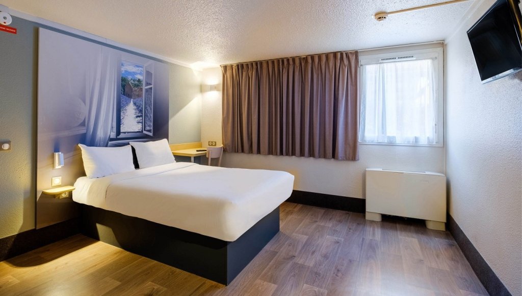 Chambre du B&B HOTEL Fr&eacute;jus Puget-sur-Argens.